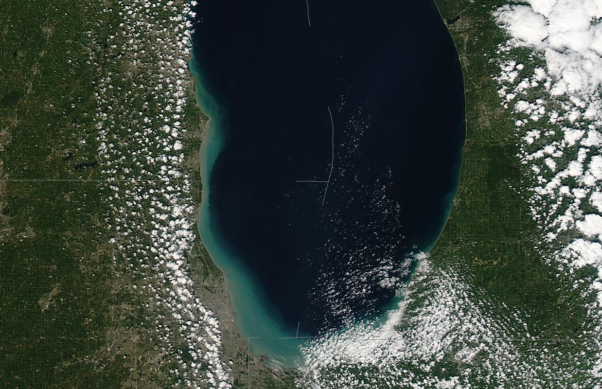 satellite showing sediment piled up along southern end of lake